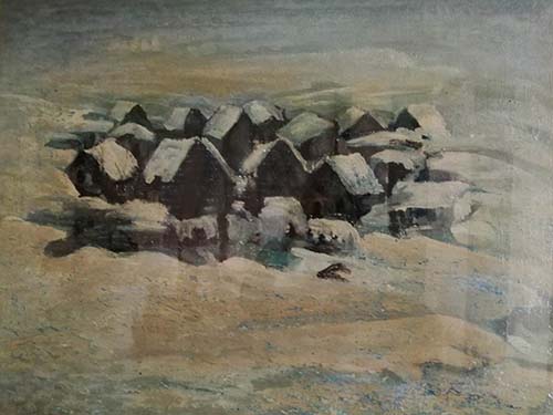 Paesaggio con case nella neve